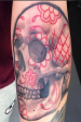 Candy skull arm tattoo